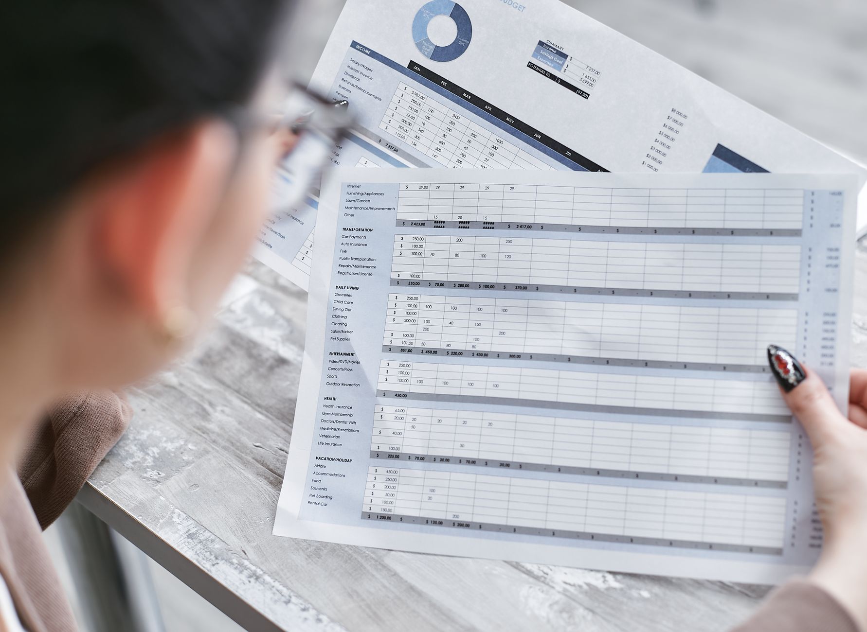 supervisor reviewing ROI spreadsheet