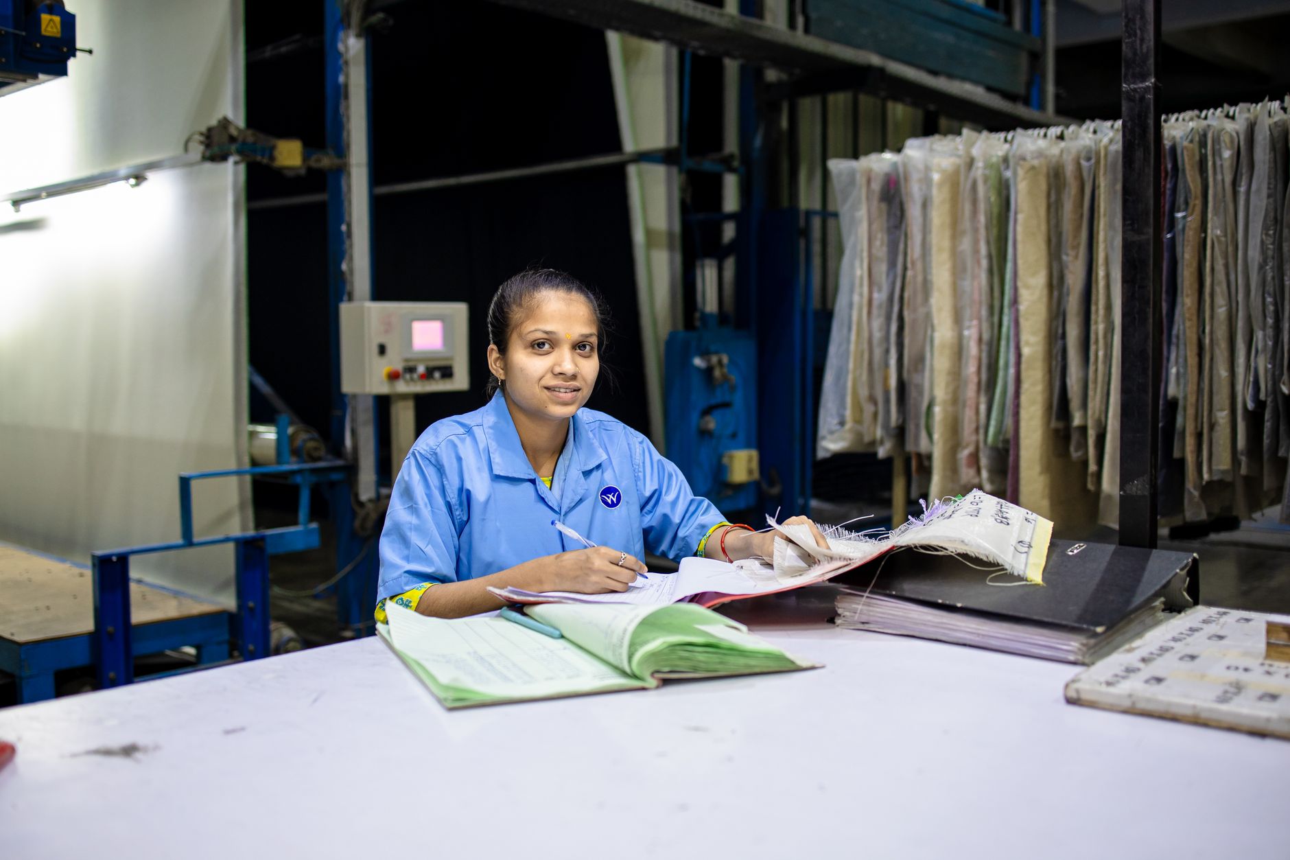factory IT manager reviewing security dashboard