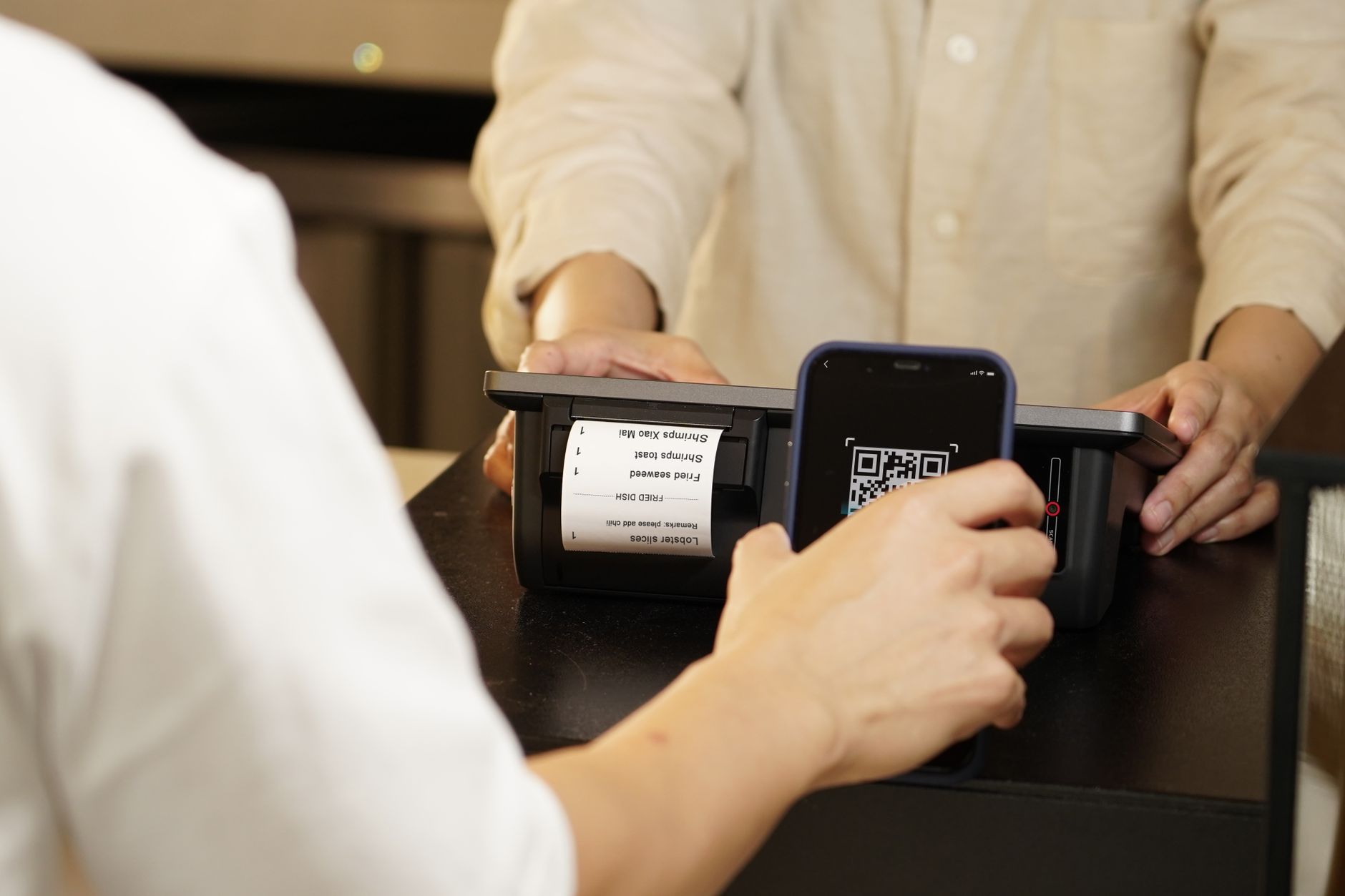 inspector scanning QR code on part