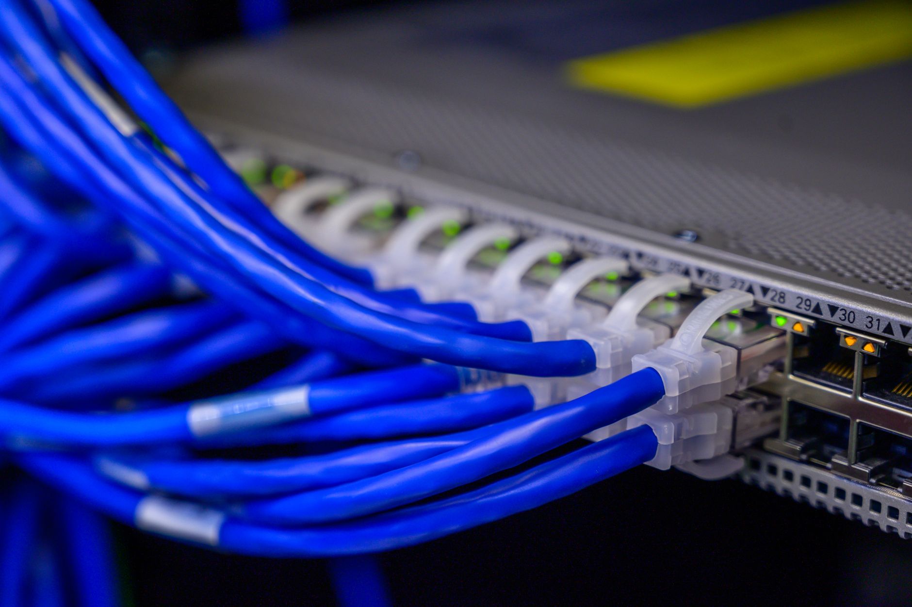 technician plugging wearable into server